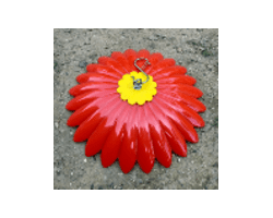 Red flower-shaped ornament with yellow center